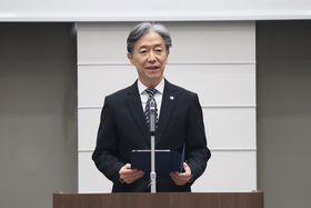 A congratulatory speeches by President SHIOZAKI.