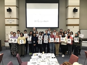 The participants and their masterpieces at the end of the event