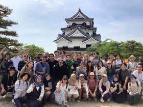 Students outside of Hikone Castle