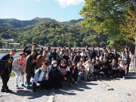 Students with “Togetsu-Kyo” in Arashiyama in the background